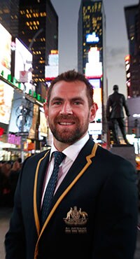AFL 2015 Media - IRS Team New York Visit Luke Hodge poses for a photo in Times Square after being named Captain of the Australian team during the International Rules Series visit to New York, USA on November 13, 2015. (Photo by Lachlan Cunningham/AFL Media)